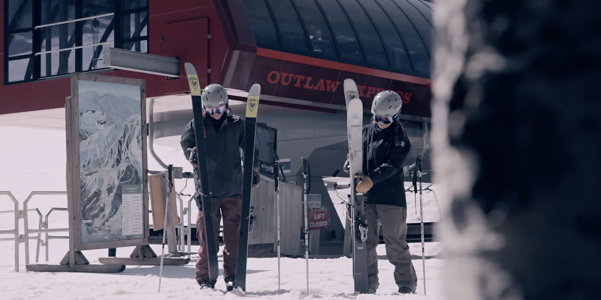 Ski Butlers technician fitting ski boots for a guest